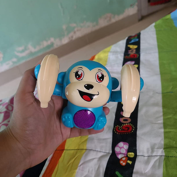 Dancing and Spinning Rolling Monkey Doll