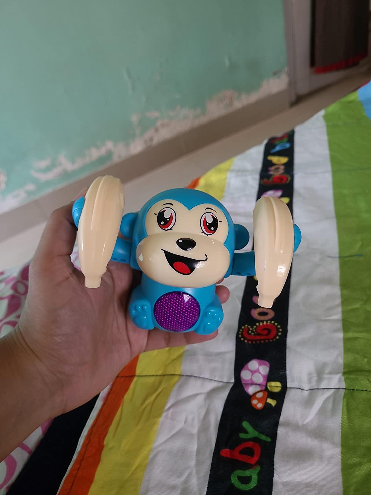 Dancing and Spinning Rolling Monkey Doll